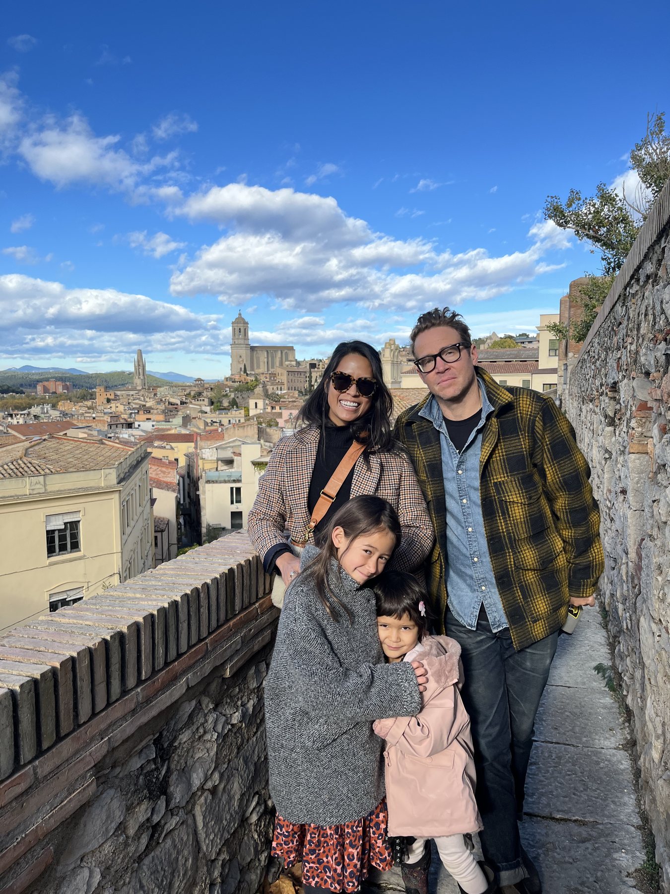 Cody and his family overlooking a historic city
