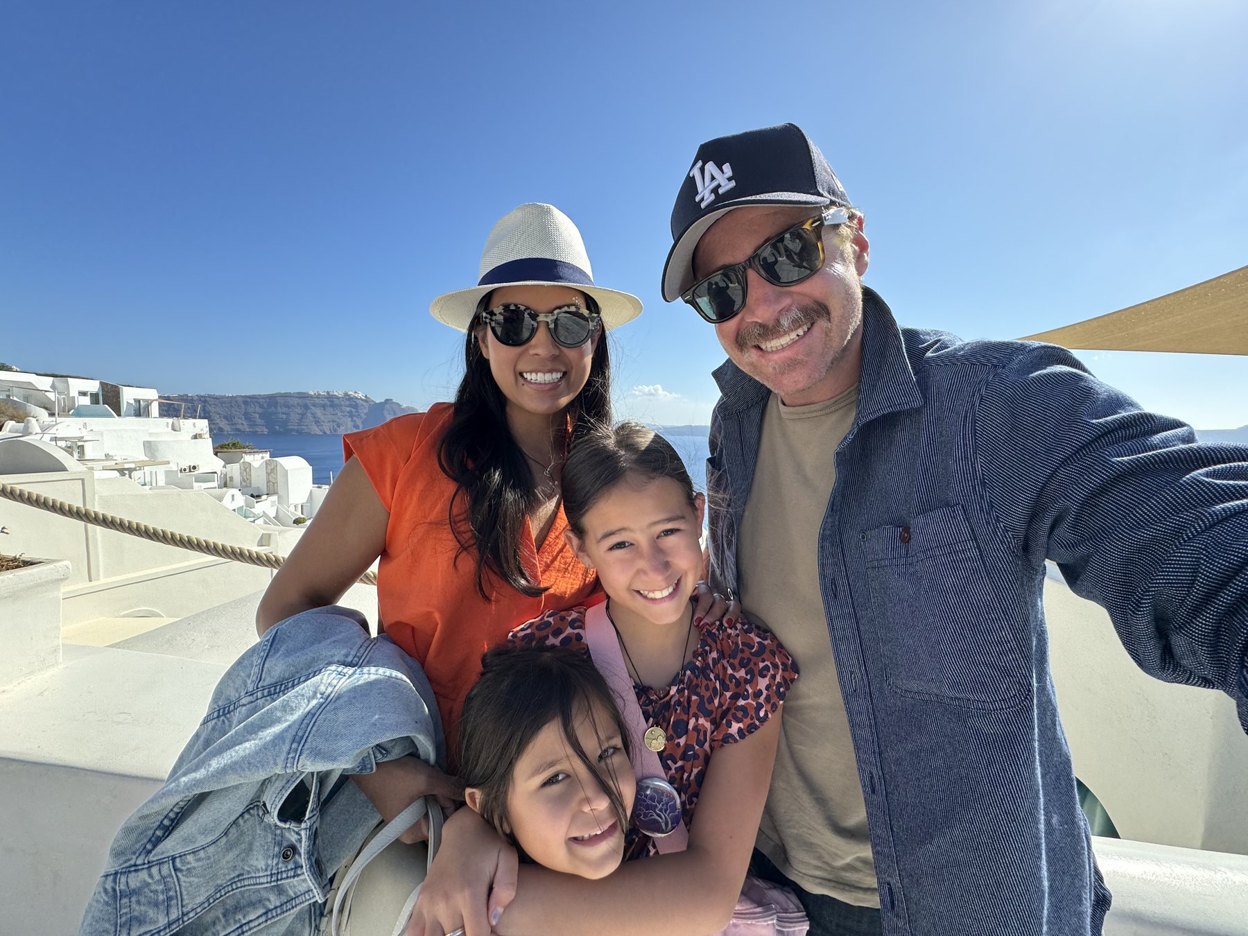 Cody and his family on a sunny Mediterranean terrace